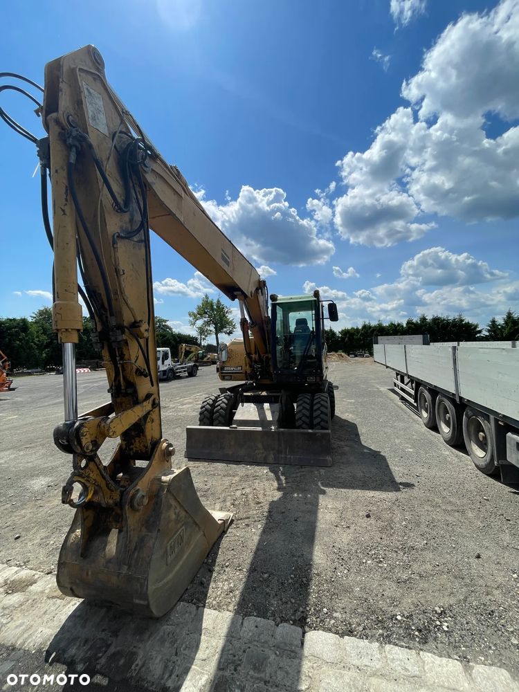 Caterpillar M316C - 3