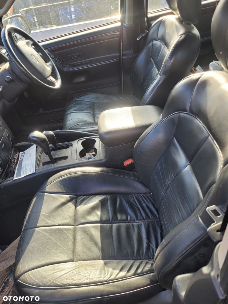 JEEP GRAND CHEROKEE WJ (ANGLIK) fotel fotele kanapa deska kokpit podsufitka boczek boczki klamka podłokietnik licznik - 3