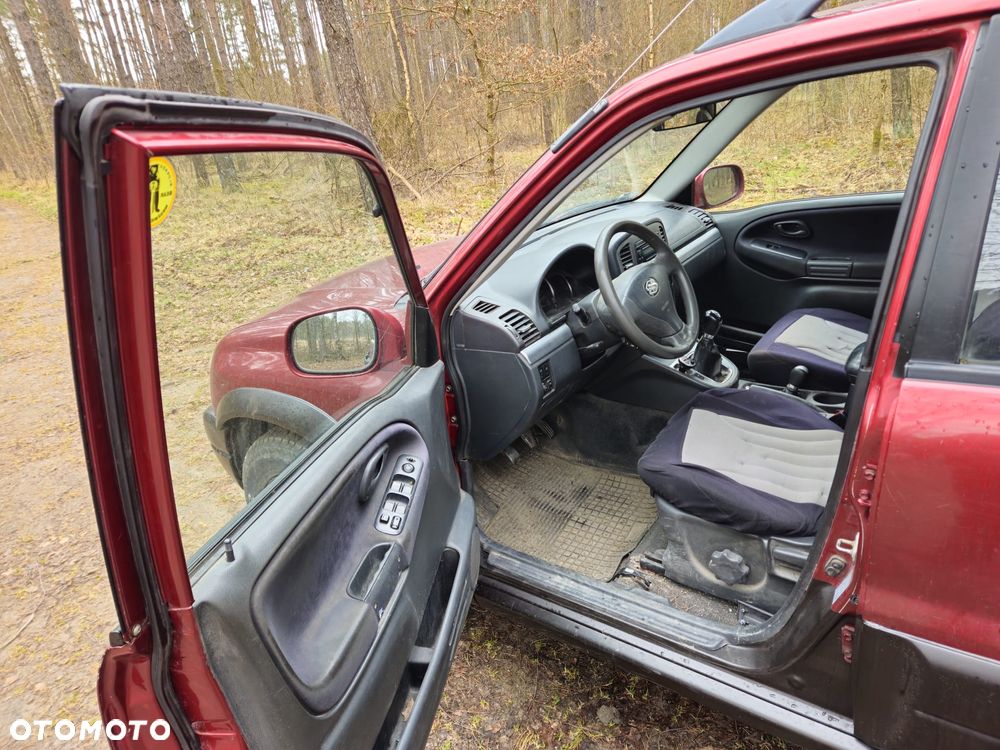 Nissan Qashqai+2 2.0 Visia - 8