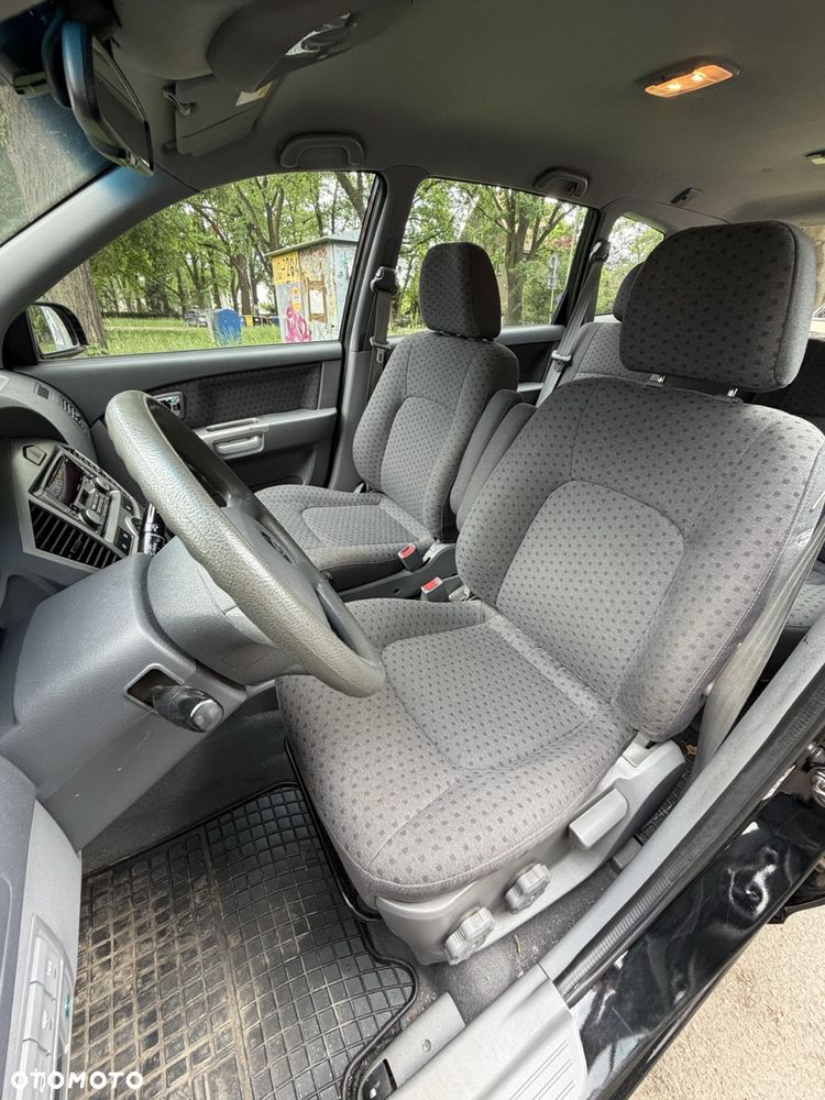 Kia Carens 2.0 EX - 11