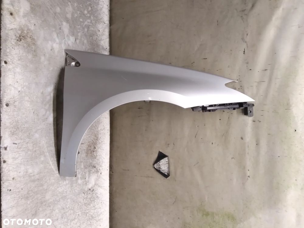 RENAULT LAGUNA III 3 BŁOTNIK PRZEDNI PRZOD PRAWY TED69 SREBRNY - 1