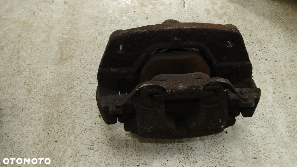BMW X5 E53 ZACISK HAMULCOWY PRAWY PRZÓD PRZEDNI 4.4 V8 - 4