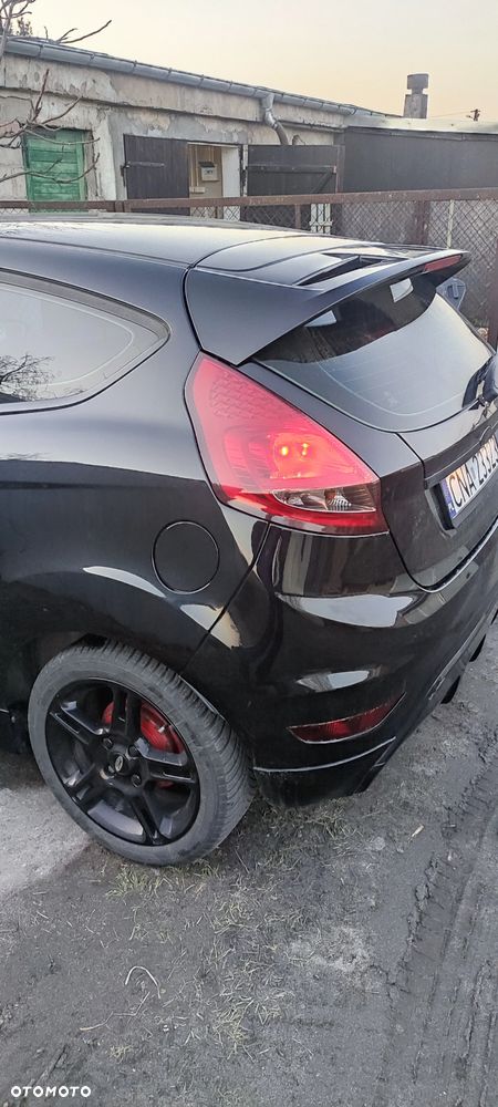 Ford Fiesta 1.4 Ghia - 10