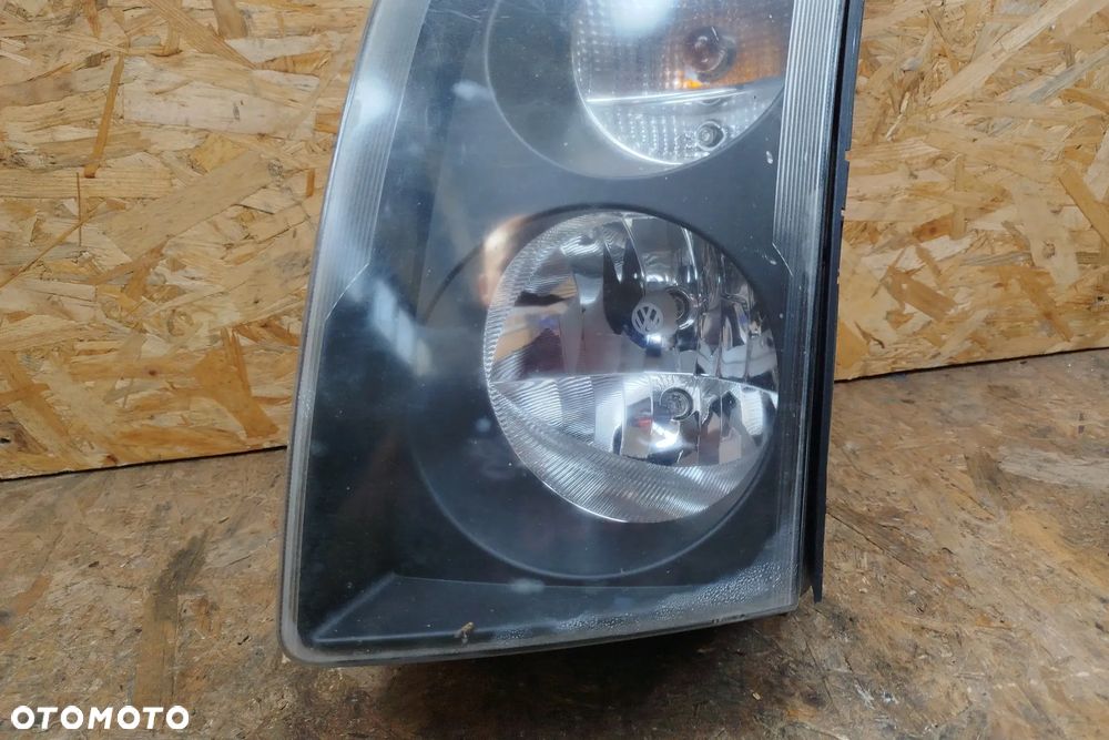lampa przód lewa HELLA kompletna do lekkiej polerki do Vw Crafter I 06- 2E1941015, wszystkie uchwyty na miejscu - 3