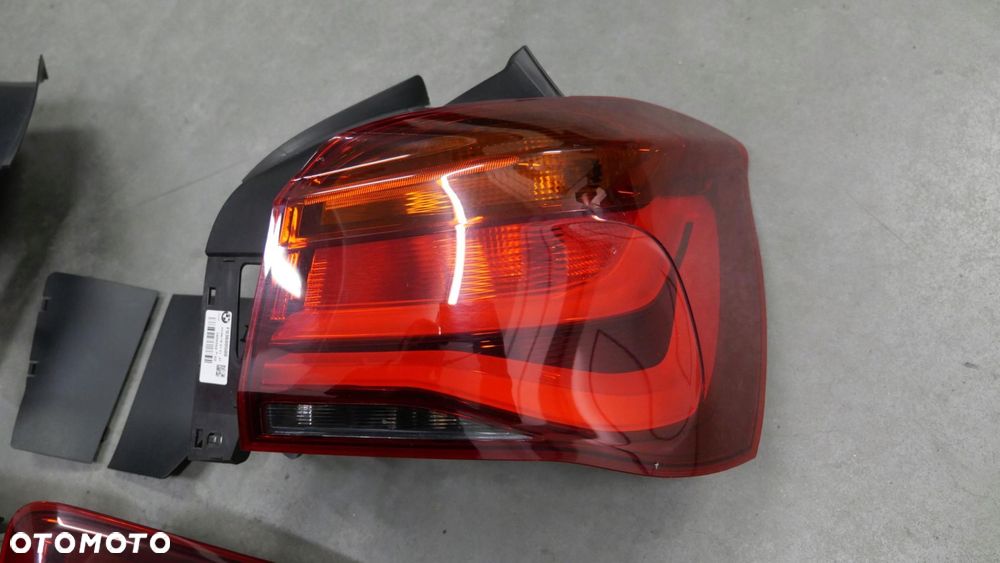 bmw f20 f21 135i 140i lift lampy tył tylne black line 7456502 7456501 - 2