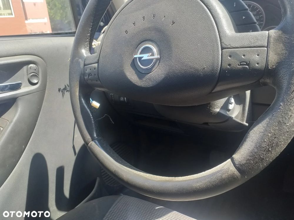 Auto na części - Opel Astra Silnik Skrzynia Drzwi Maska Klapa Błotnik Zderzak Lampa Szyba Klamka Lusterko Deska Kokpit - 7