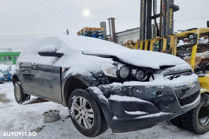 butoane geamuri electrice clapeta acceleratie rezervor bara spate haion portbagaj stop tripla usa oglinda portiera stanga dreapta  plansa ceasuri bord display  spira volan bloc lumini kit airbaguri Chevrolet Aveo T300 2012, motor 1.3 cri 96cp, cod motor A13DTE, cutie de viteze manuala 5 trepte - 1
