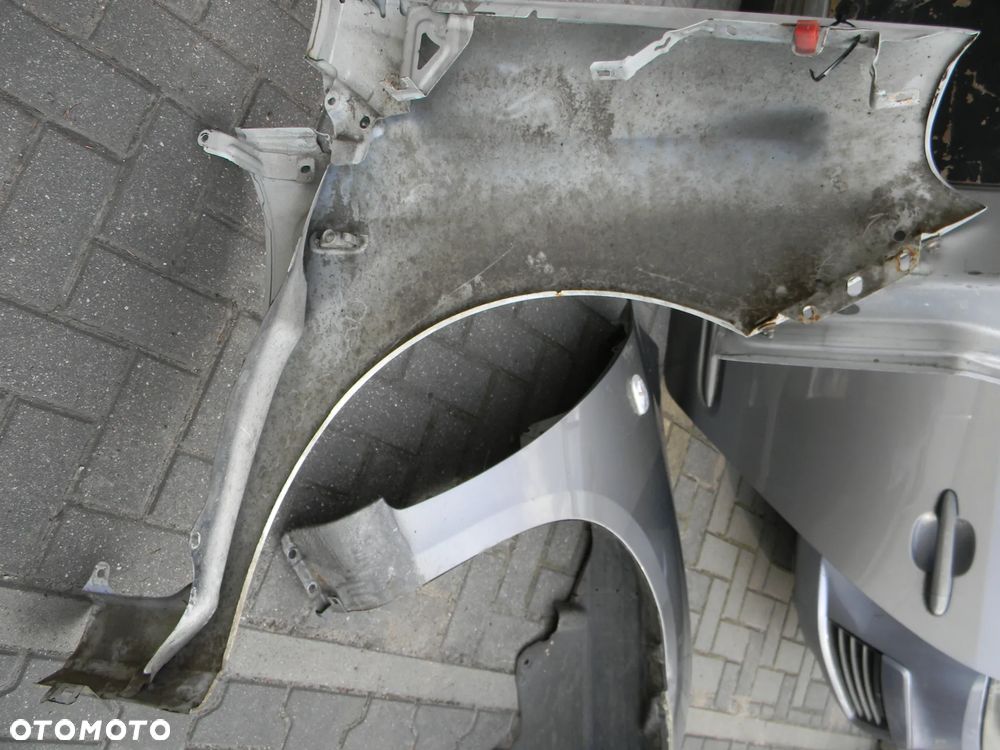 błotnik lewy przód FIAT GRANDE PUNTO biały - 7