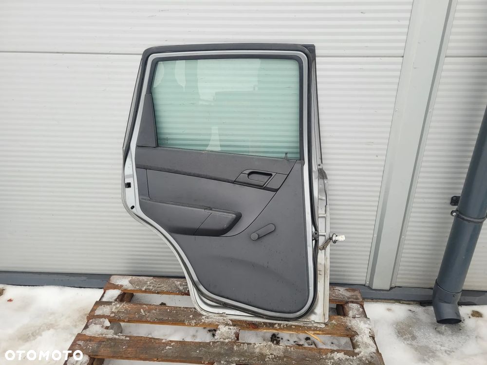 Chevrolet Aveo II 09r T255 5d hb Drzwi lewy przod - 13