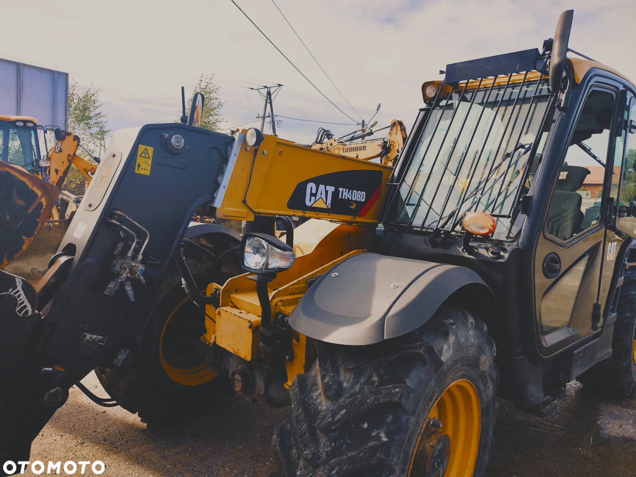 Caterpillar TH408 - 11