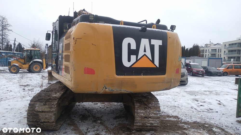 Caterpillar 323F - 12