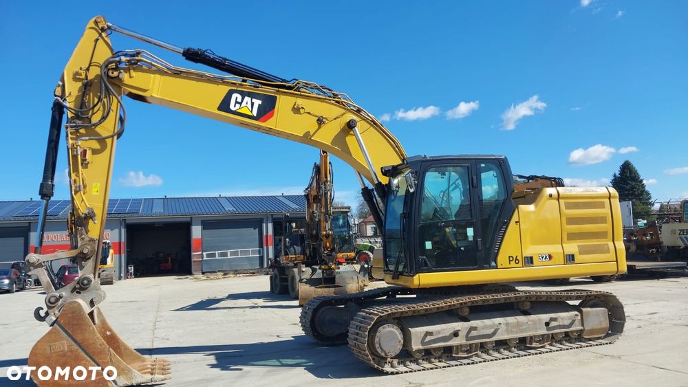 Caterpillar 323 - 13