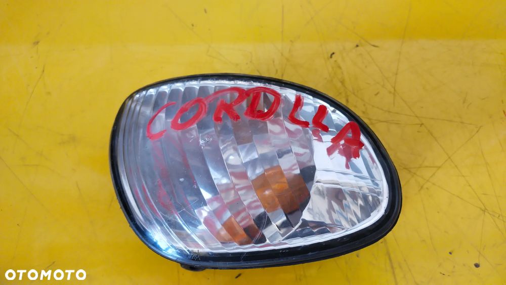 TOYOTA COROLLA E11 00R KIERUNKOWSKAZ PRZEDNI PRAWY - 1