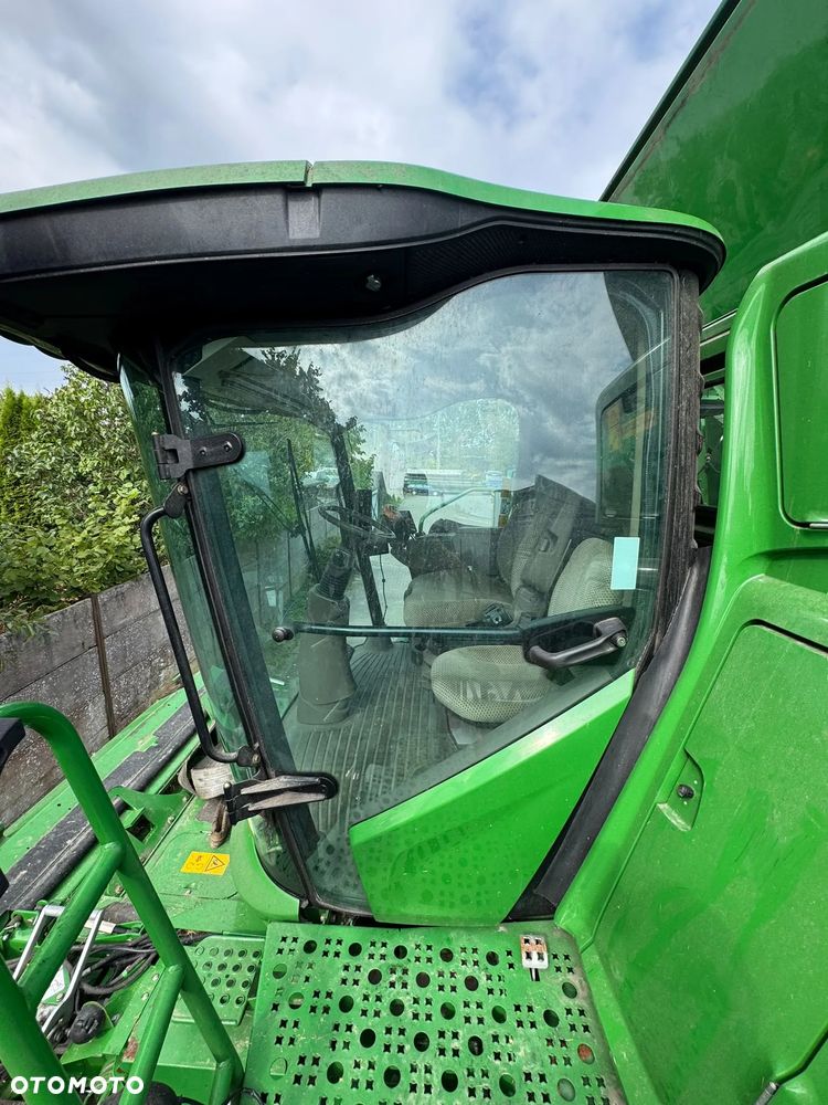 John Deere T670 - 14