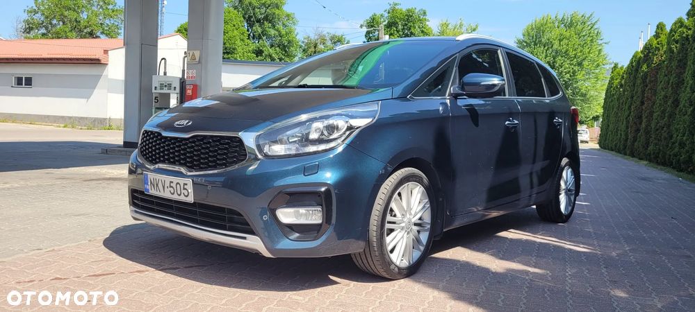 Kia Carens - 4