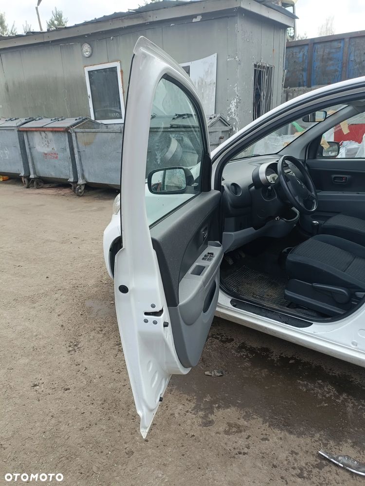 DAIHATU SIRION II 04-10 r. W09 DRZWI lewy przód lewe ** - 8