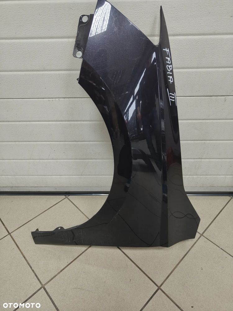 Skoda Fabia III 3 lewy BŁOTNIK PRZEDNI