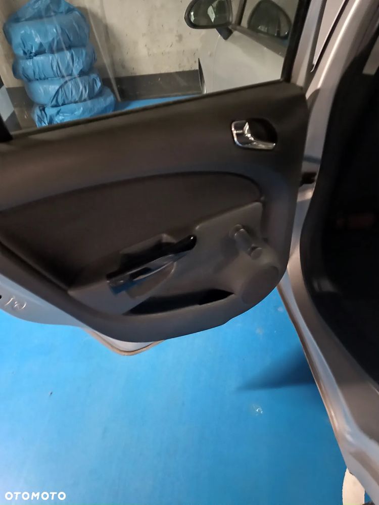 Opel Corsa 1.2 16V Enjoy - 18