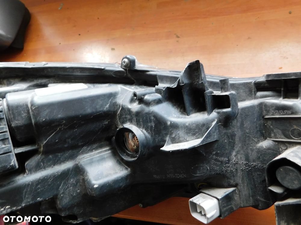 lampa lewa przód TOYOTA COROLLA E21 EU - 10