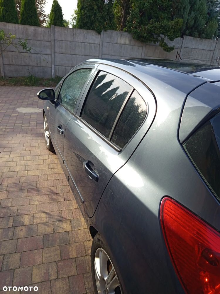 Opel Corsa 1.2 16V Cosmo - 12