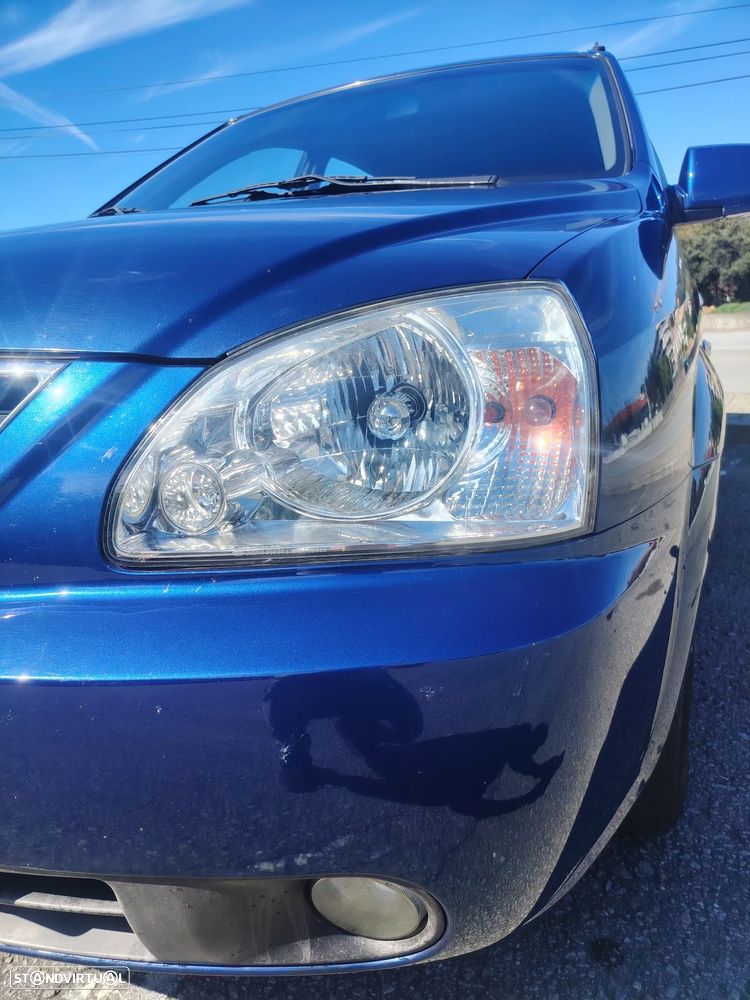 Kia Carens - 4