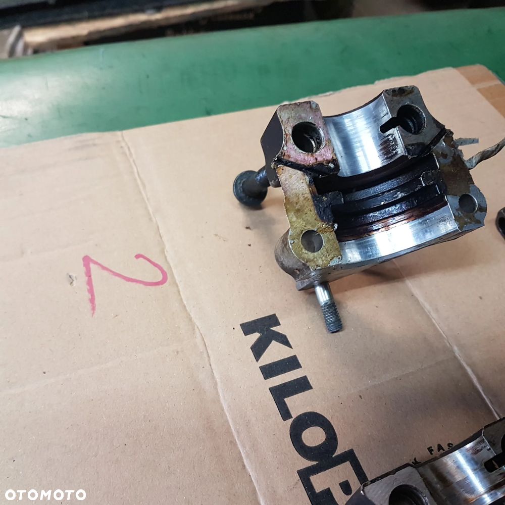 podpora koło pasowe wałka rozrządu doblo siena palio lancia punto seicento cinQecento uno panda 1.2 1.1 8v 96- - 14