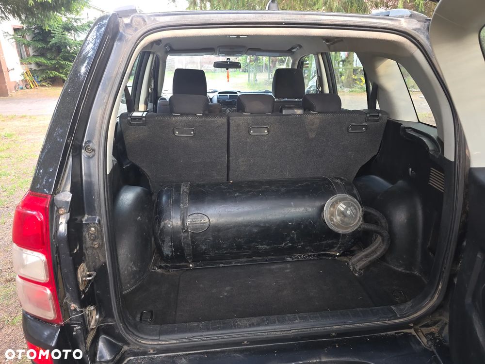 Suzuki Grand Vitara 2.0 Club - 12