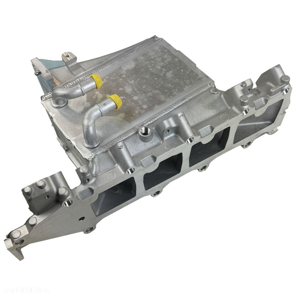 Kolektor ssący AUDI SEAT SKODA VW chłodnica powietrza dolotowego 04L129711M - 2