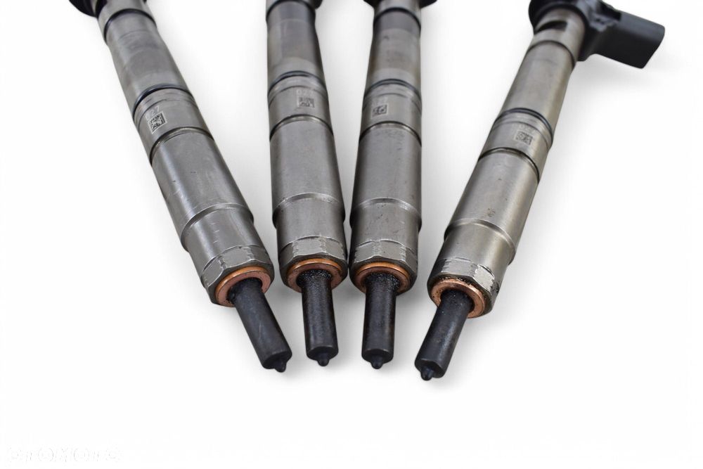 Wtryskiwacz VW PASSAT B7 GOLF VI AUDI A3 8P SEAT LEON II 2.0 TDI 03L130277 - 2