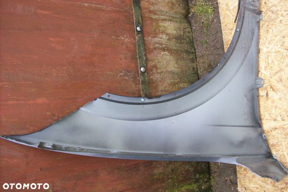 BŁOTNIK PRZEDNI LEWY VW TUAREG III - 4