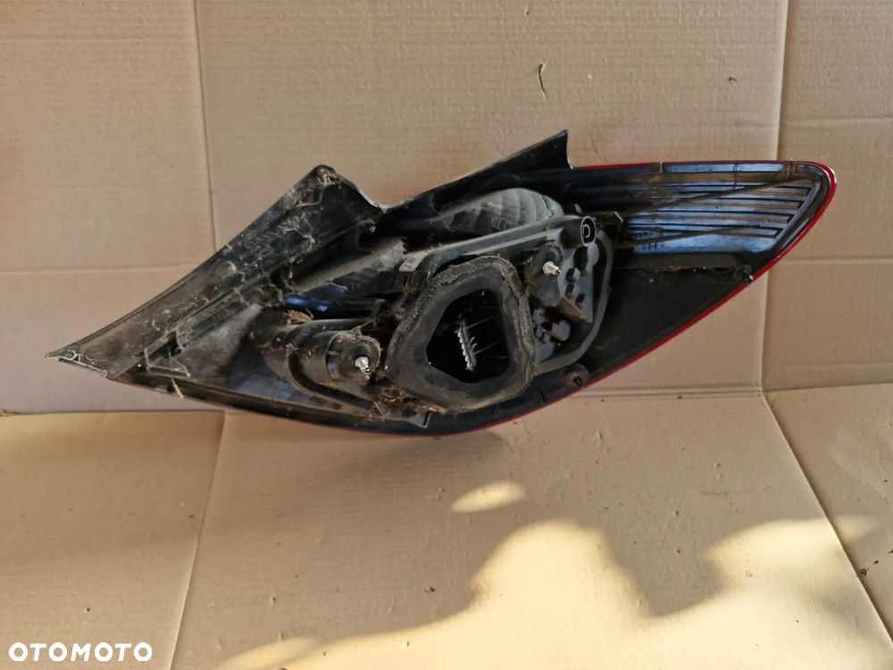 Lampa prawa lewa tylna tył Opel Corsa D EUROPA 5 drzwi jasna - 2