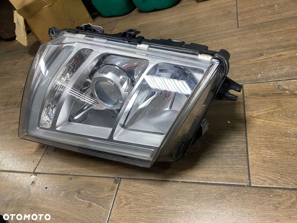 LAMPA PRAWA VOLVO FH4 XENON LED KMP ORG - 2