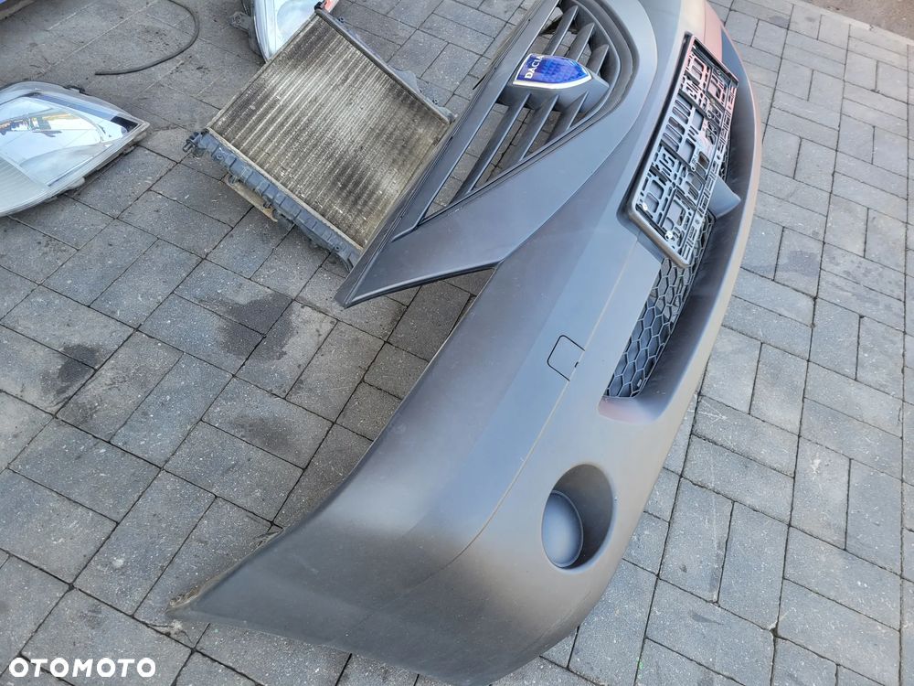 Dacia Logan I 04-08 1.4 Zestaw maska lampy blotniki chlodnica zderzak - 11