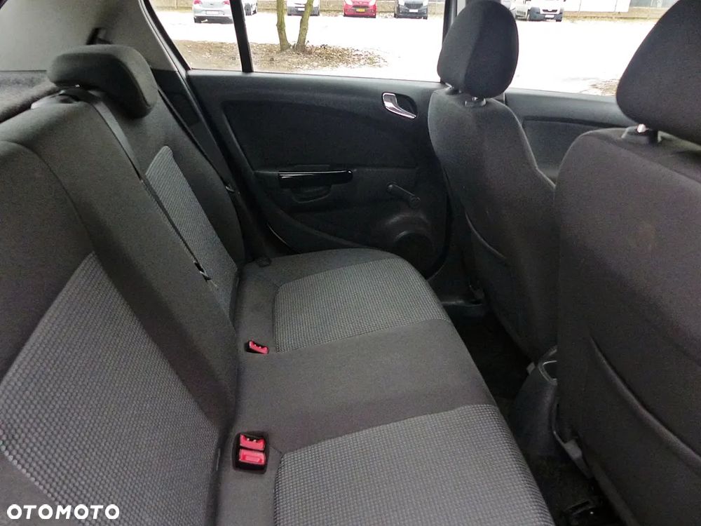 Opel Corsa 1.2 16V Enjoy - 23