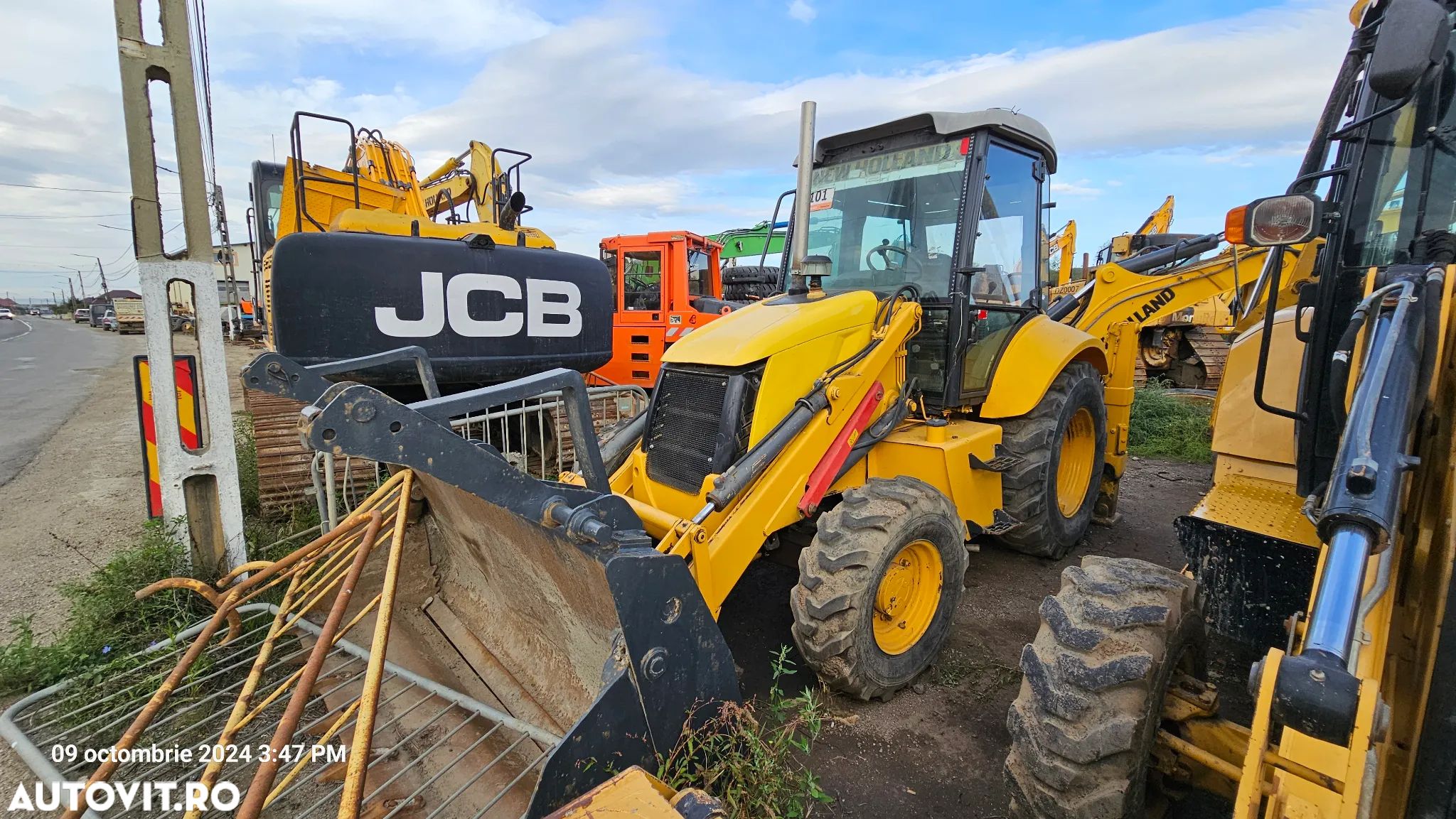 Alta Buldoexcavator New Holland B 90 B - 1