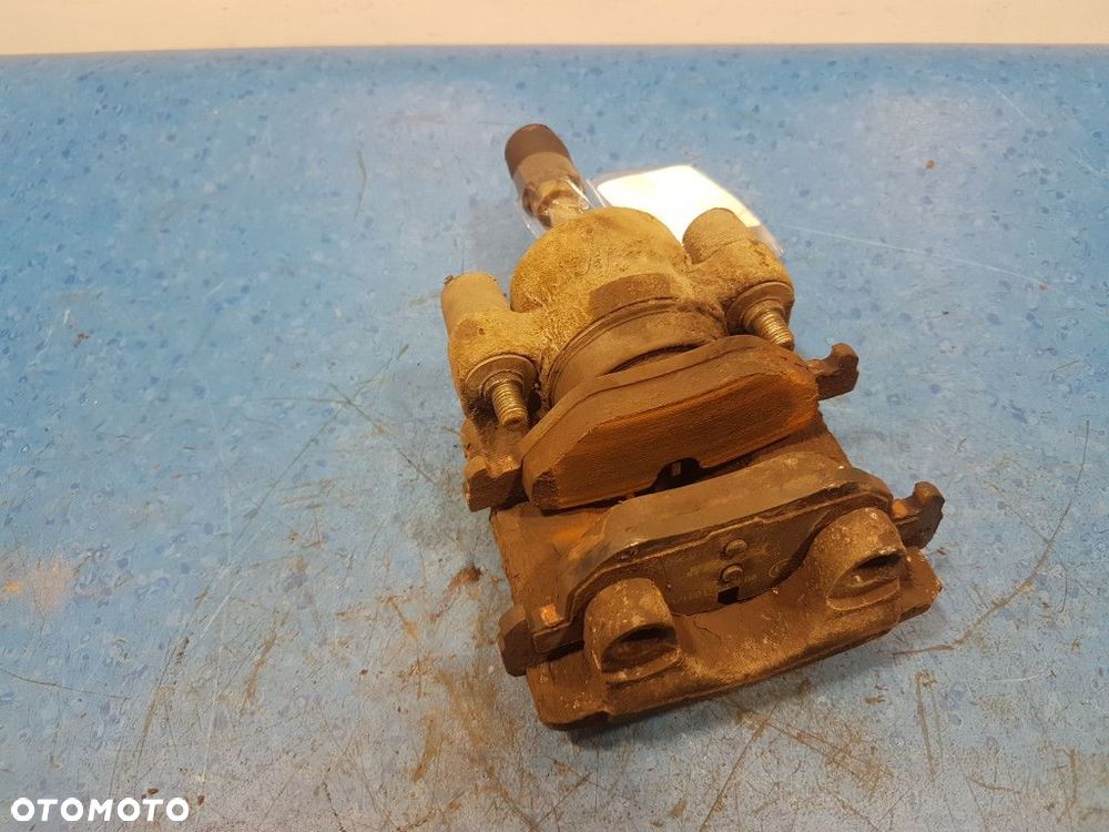 BMW 1 E87 2.0D ZACISK HAMULCOWY TYŁ PRAWY  N47 - 5