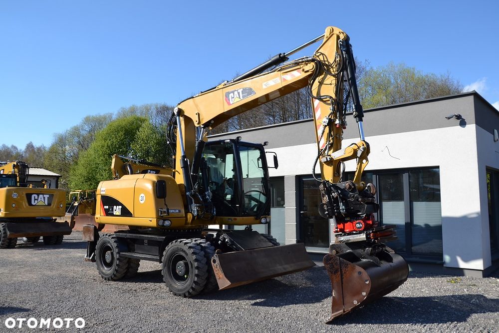 Caterpillar M 313 D, ROTOTILT - 14