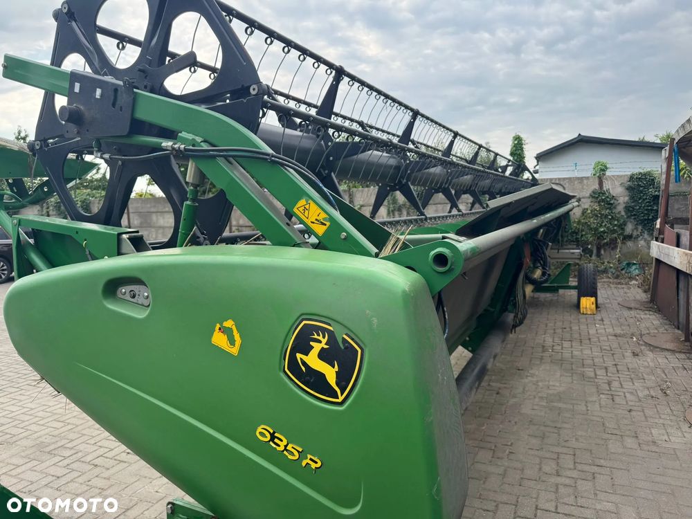 John Deere T670 - 22