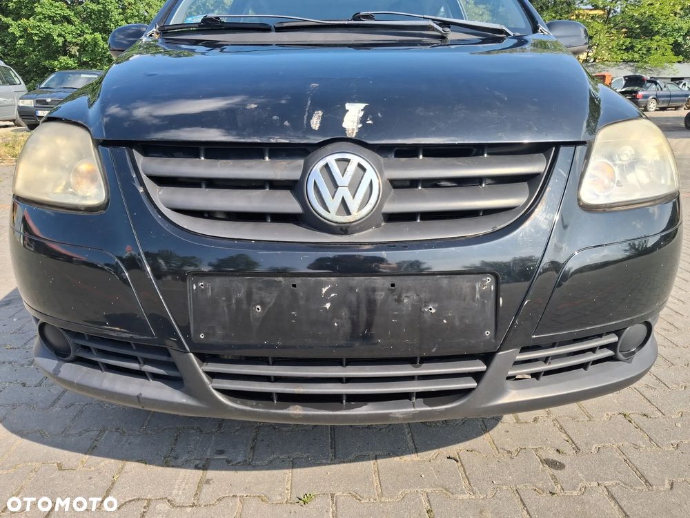Volkswagen Fox silnik kompletny 1.4 TDI BNM 70KM skrzynia biegów HCS drzwi klapa zderzak błotnik lusterko kolor czarny N2C/BC pompowtrysk turbina dwumasa sprzęgło sterownik moduł przewód rura wiązka maglownica czujnik mcperson zwrotnica piasta zacisk pompa pompka alternator sprężarka klimatyzacji panel szyba boczek fotel kierownica lewarek przepustnica pokrywa osłona nadkole zbiorniczek klema wiązka mechanizm lampa belka sanki zamek schowek zegary manetki NA CZĘŚCI - 2