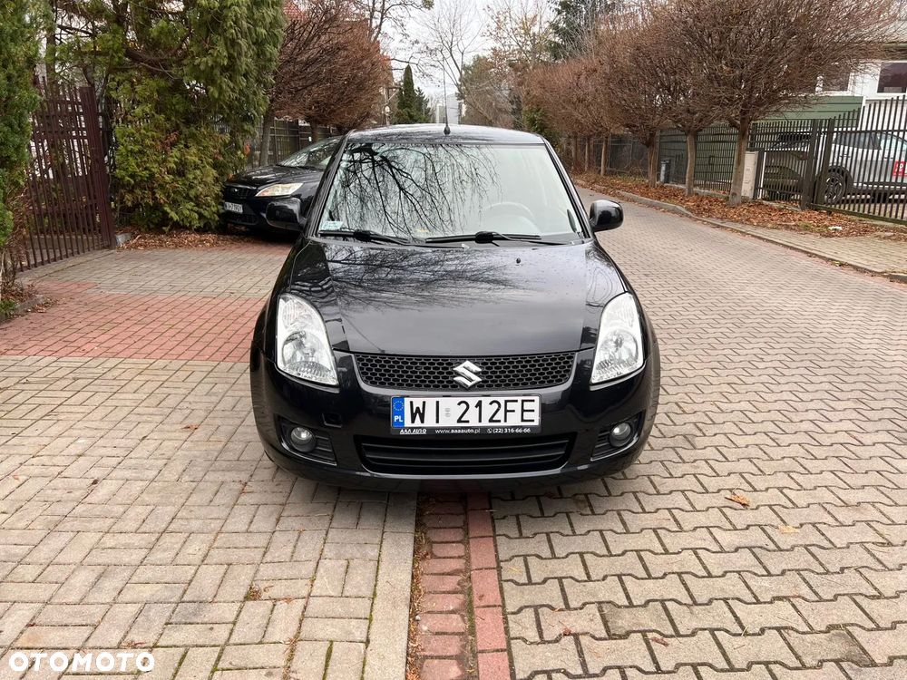 Suzuki Swift 1.3 Club - 8