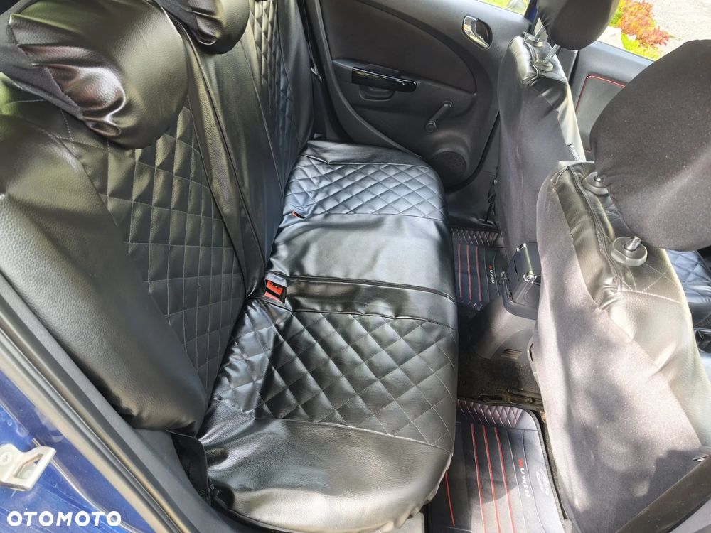 Opel Corsa 1.2 16V Cosmo - 7