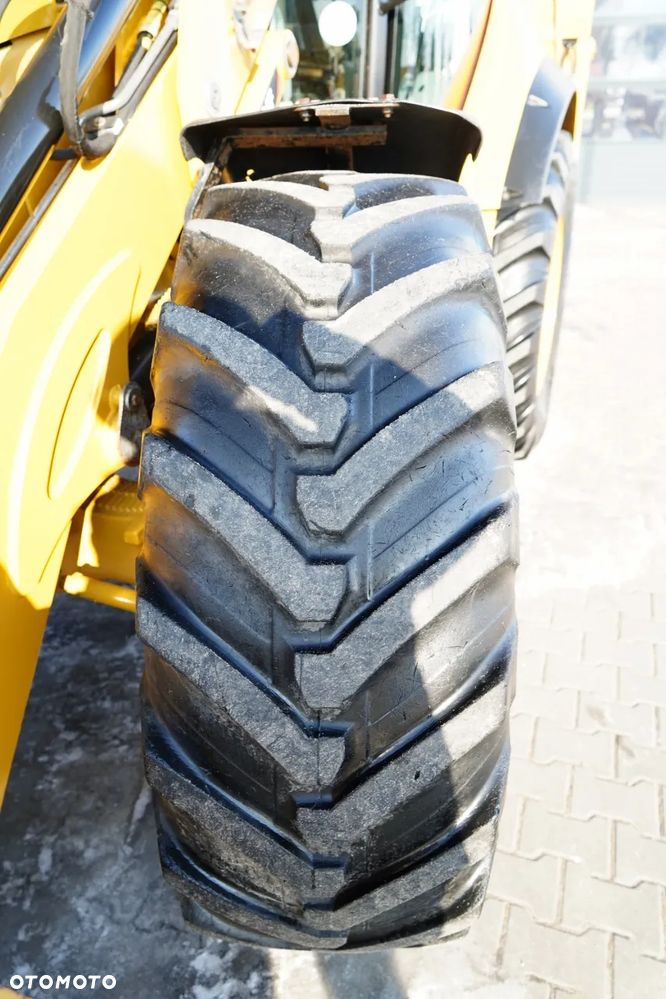 Caterpillar 434F / KOPARKO-ŁADOWARKA /  5 500 MTH / - 23