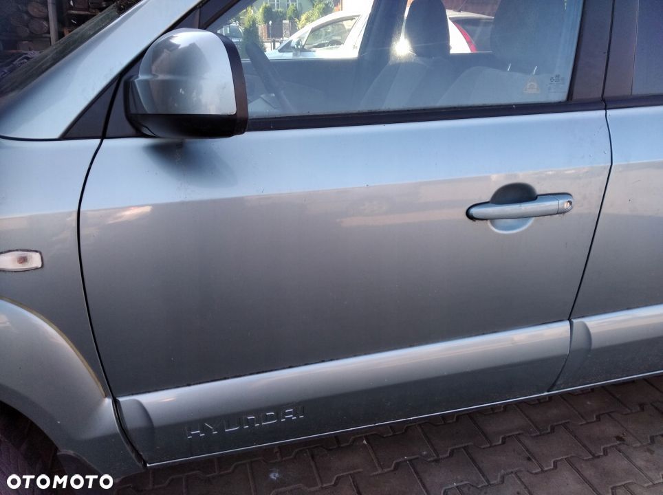 Hyundai Tucson drzwi przod przednie prawe BU - 2