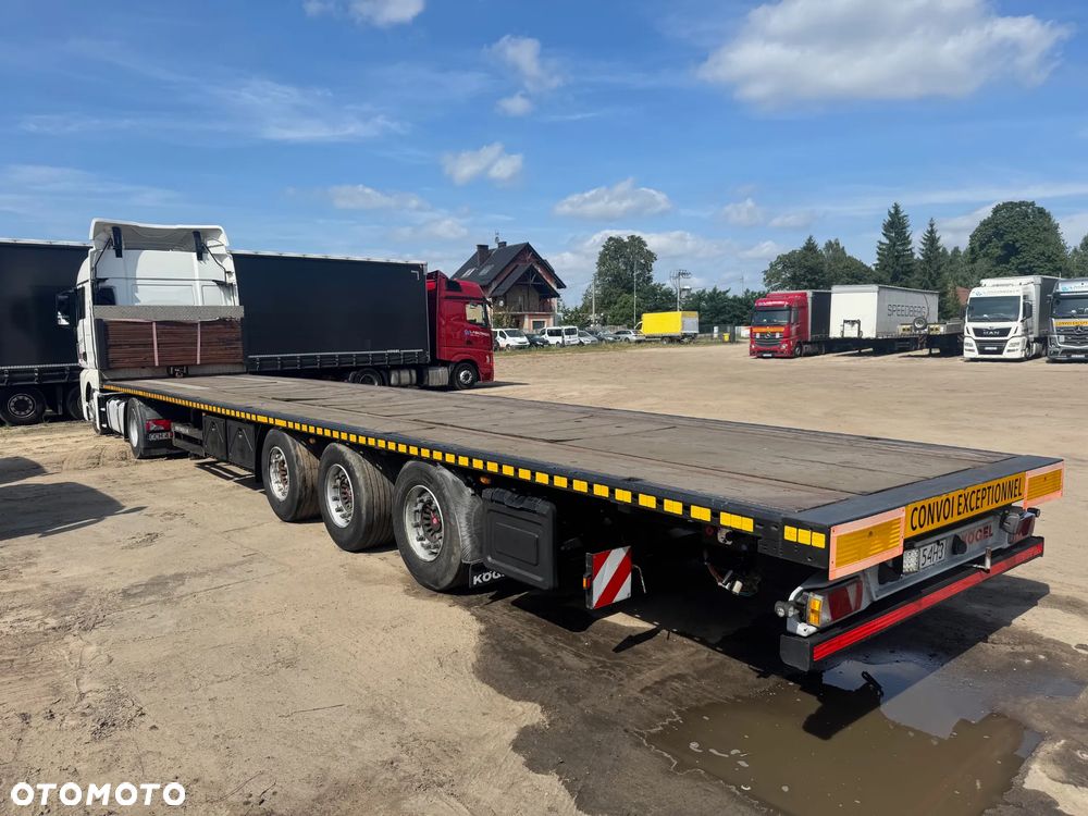 Kögel SN24 / platforma / najazdy / wciągarka - 1