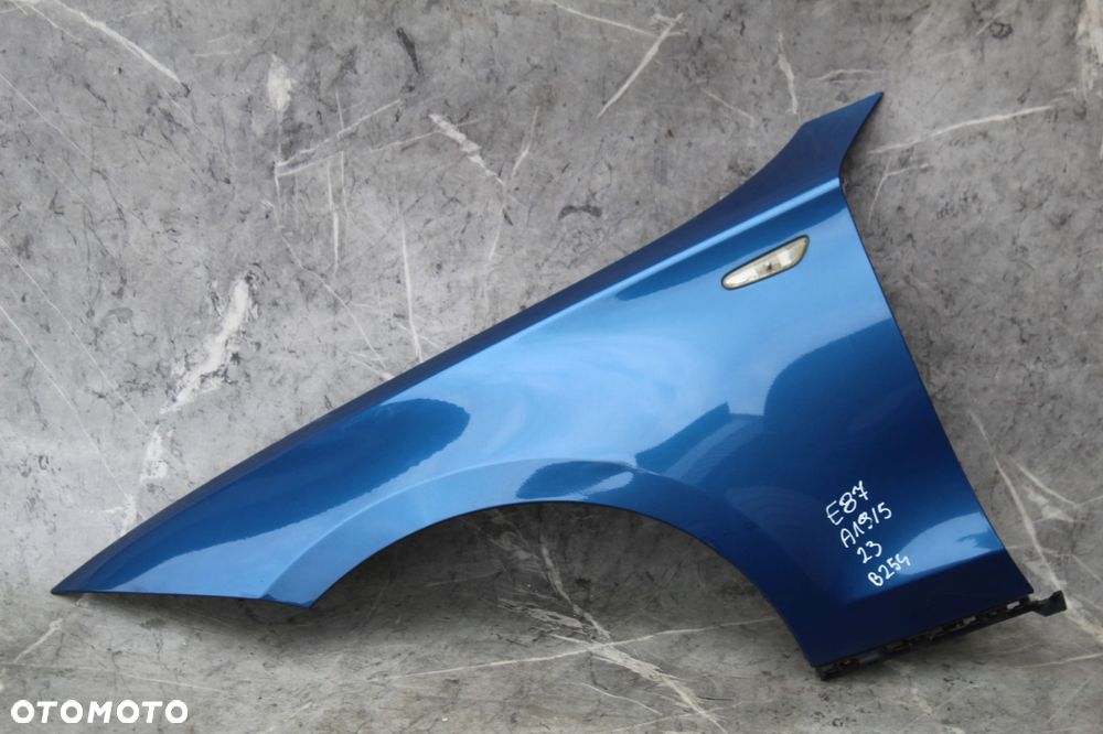 BŁOTNIK LEWY PRZÓD BMW E81 E82 E87 E88 A19 SYDNEYBLAU