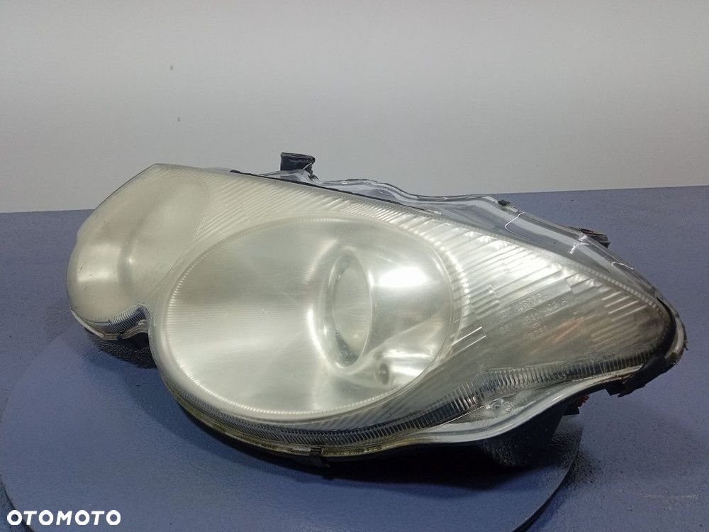 CHRYSLER 300M REFLEKTOR LEWY LAMPA EU 04780003AC - 2