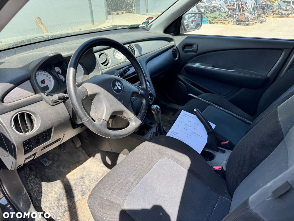 MITSUBISHI OUTLANDER 2007 *SAMOCHÓD NA CZĘŚCI* 5428 X42A MASKA, LAMPA, DRZWI, LUSTERKO, ZDERZAK, GRILL, BŁOTNIK, KLAPA, BELKA, DESKA, FOTELE, KANAPA, ĆWIARTKA KIEROWNICA, TARCZE, ZACISKI, ZAWIESZENIE, KOMPLETNY PRZÓD, KOMPLETNY TYŁ, LICZNIK, ZEGARY, PRAWE LEWE PRZÓD TYŁ - 5