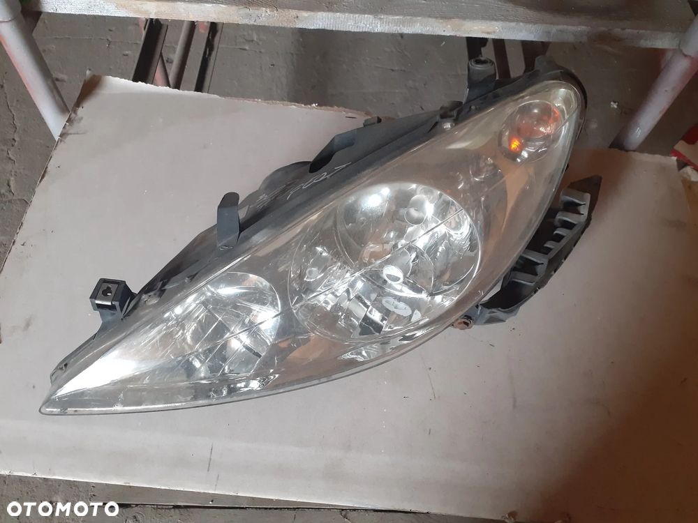 12288 Lampa lewy przód TYC Peugeot 307 SW - 1