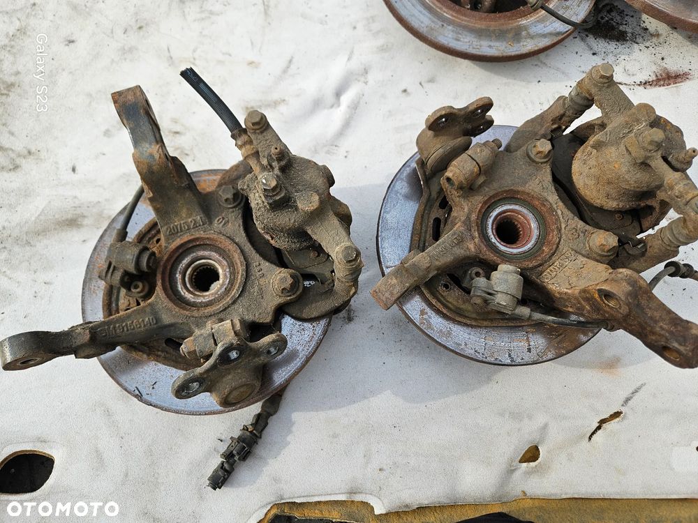 Zwrotnica piasta lewa prawa przód przednia zacisk jarzmo tarcza czujnik ABS Opel Corsa C 1,0 12V 9156140 9156141 - 4