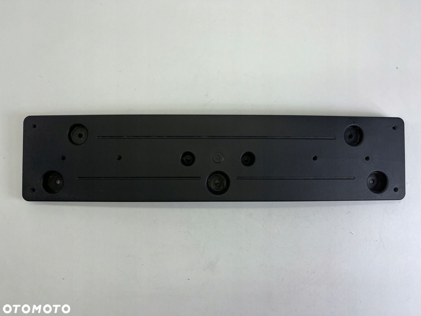 LISTWA PODKŁADKA POD TABLICĘ REJESTRACYJNĄ PRZÓD F34 GT OE 7295786 - 1